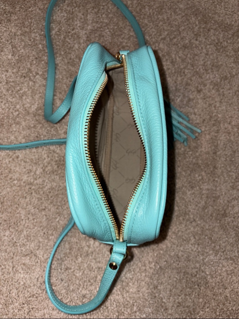 Textured Turquoise Crossbody Bag with Tassel Accent - Picture 6 of 7